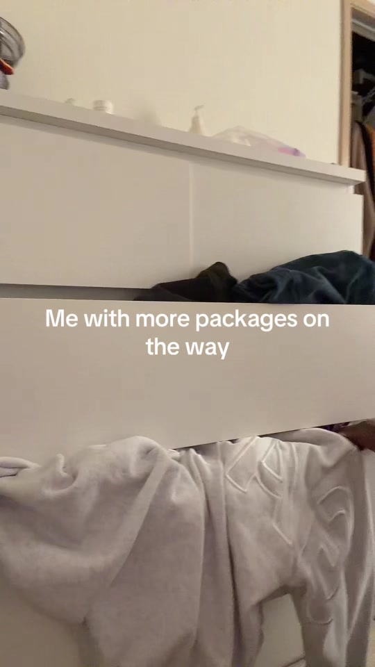 An overflowing clothes drawer in Temi’s Garage video
